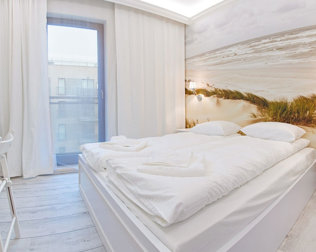 Każdy apartament posiada klimatyczną, zamykaną sypialnię z łóżkiem małżeńskim