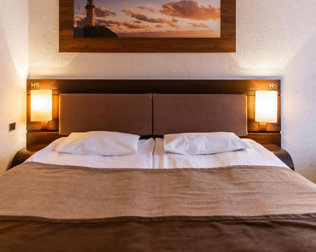 Goście mogą wybrać między łóżkiem małżeńskim i łóżkami pojedynczymi
