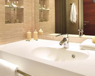 Każdy pokój dysponuje prywatną łazienką z wysokiej jakości wyposażeniem