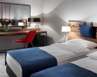 W pokojach Standard znajdują się dwa pojedyncze łóżka z możliwością złączenia